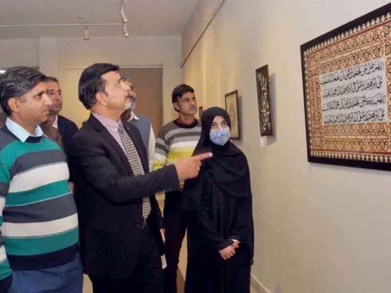pal chairman dr yousuf khushk and deputy director sajjad hussain visit the islamic calligraphy exhibition at the punjab arts council photo express pal chairman dr yousuf khushk and deputy director sajjad hussain visit the islamic calligraphy exhibition at the punjab arts council photo express