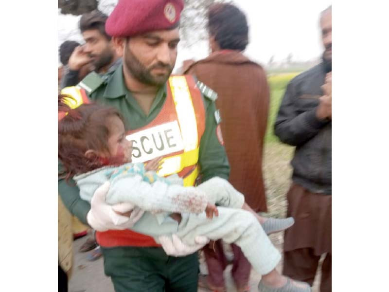 a child is being taken to a hospital by a rescue worker photo express