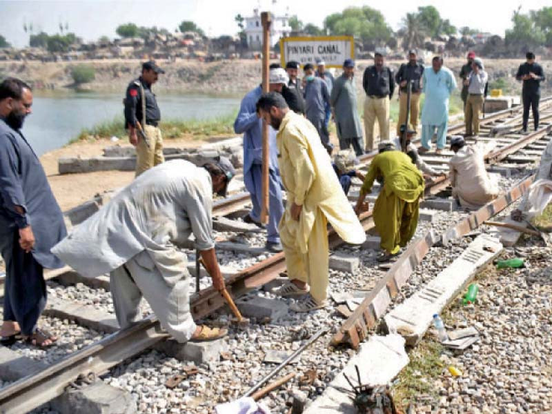 a bomb disposal squad inspects damaged tracks in hyderabad photo online