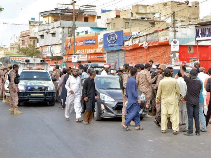 rangers personnel disperse a crowd in the korangi area where tensions ran high during the na 240 by elections on thursday photo jalal qureshi file rangers personnel disperse a crowd in the korangi area where tensions ran high during the na 240 by elections on thursday photo jalal qureshi file