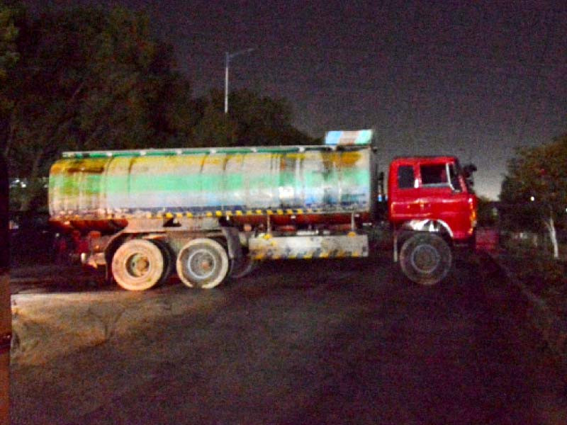 police have parked a tanker to block sharae faisal near the karachi police office during operation against the terrorists photo jalal qureshi express