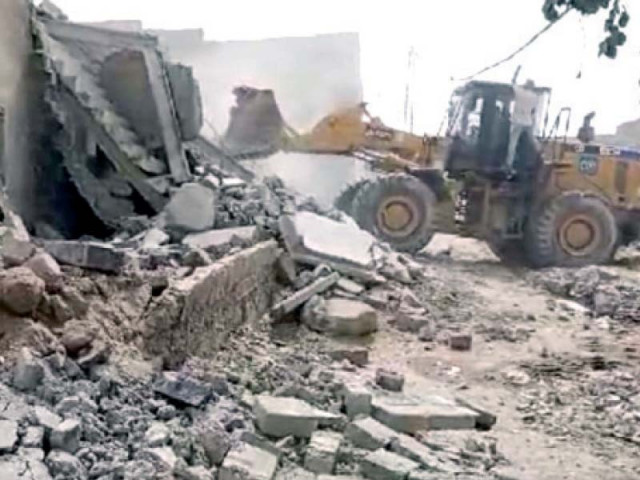 kda removes encroachments in surjani town kda removes encroachments in surjani town