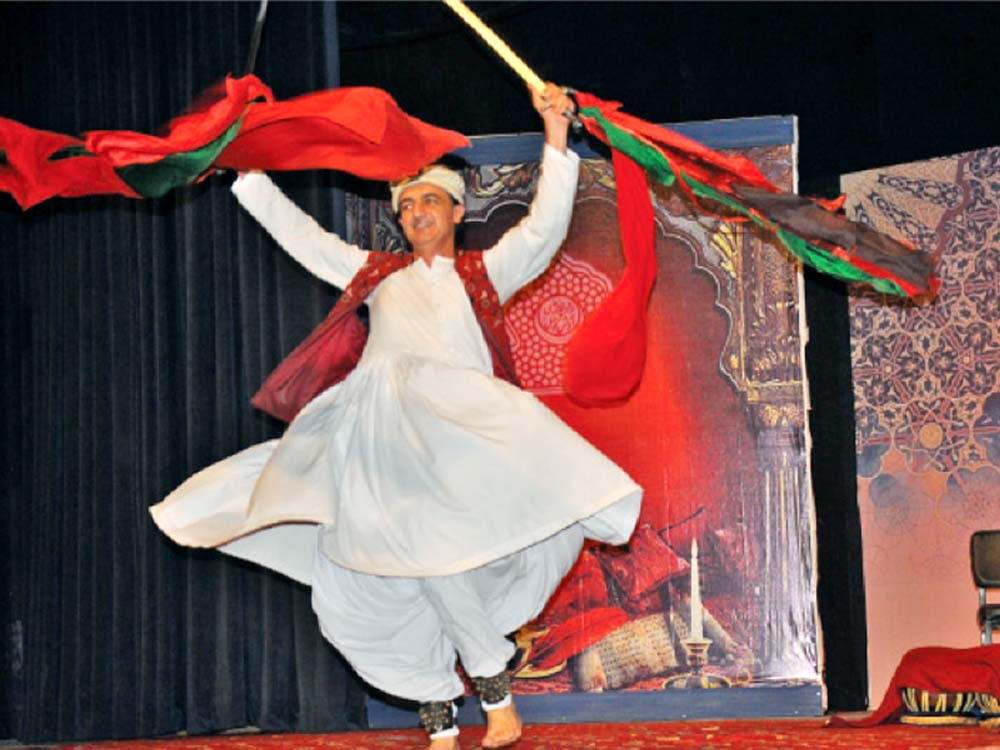 Artists performs the Attan, a traditional Pashtun folk dance, at the ‘Rawal Literary Festival’ organised by Rawalpindi Arts Council. PHOTO: EXPRESS