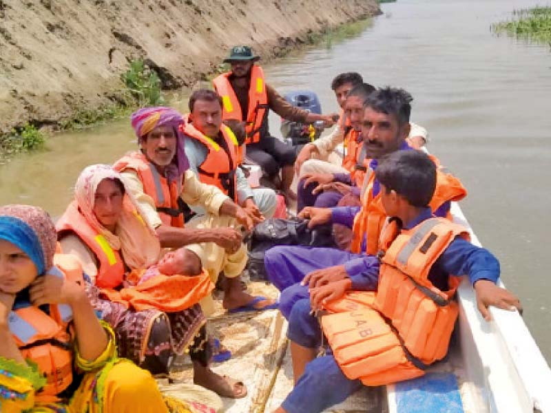 as the river sutlej breaks its banks residents of small hamlets in bahawalnagar evacuate and move to higher grounds photo express file
