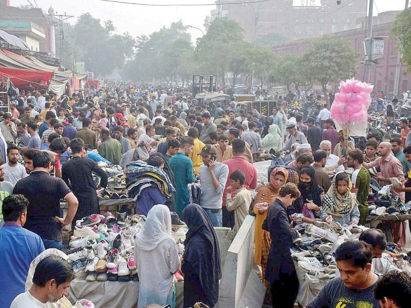 citizens throng a bazaar in lahore to purchase second hand warm clothes ahead of winter photo nni