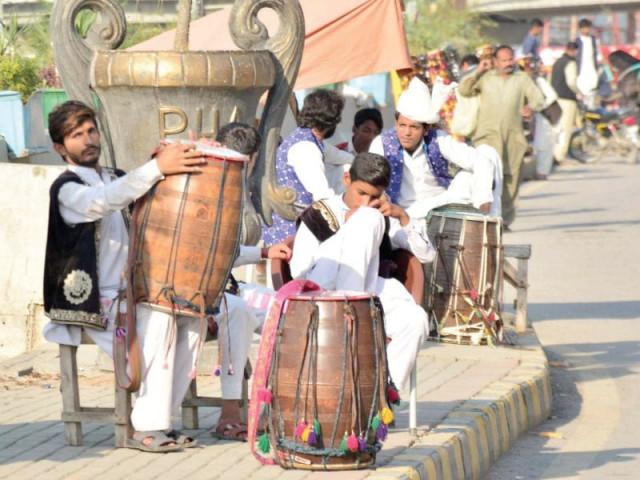 traditional performers including dhol walas await clients along the murree road in rawalpindi photo agha mahroz express traditional performers including dhol walas await clients along the murree road in rawalpindi photo agha mahroz express