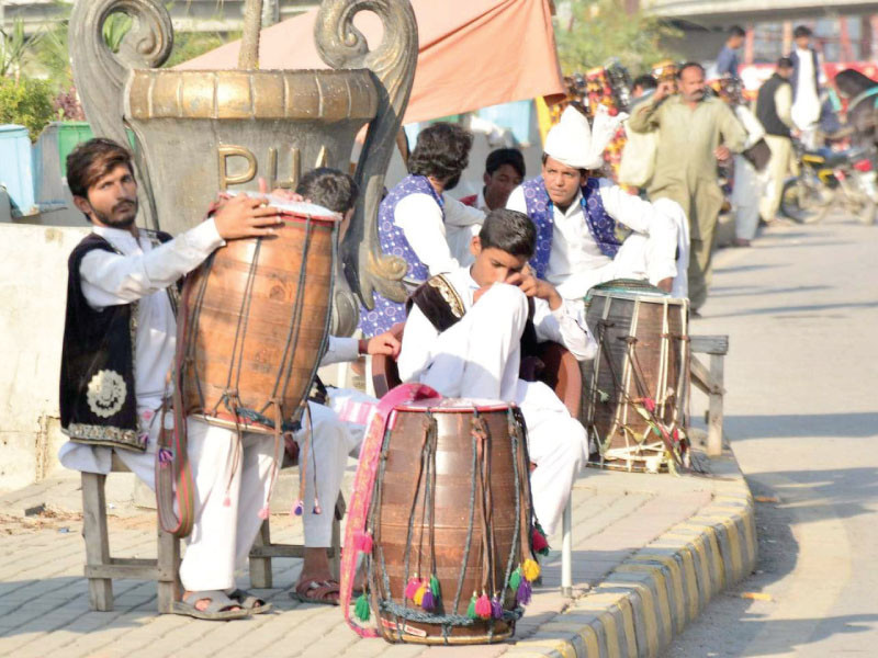 traditional performers including dhol walas await clients along the murree road in rawalpindi photo agha mahroz express