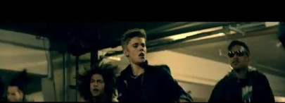 bieber spotlights his grown up side in flashy new video