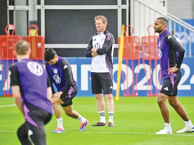 germany coach julian nagelsmann c watches the euro 2024 host team in training on wednesday photo afp