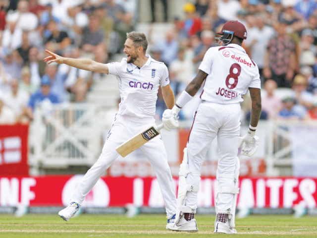england s chris woakes celebrates taking the wicket of west indies alzarri joseph caught out by jamie smith photo reuters england s chris woakes celebrates taking the wicket of west indies alzarri joseph caught out by jamie smith photo reuters