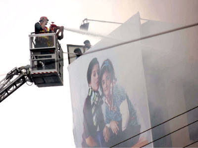 floor on fire blaze destroys shops on fourth floor of plaza