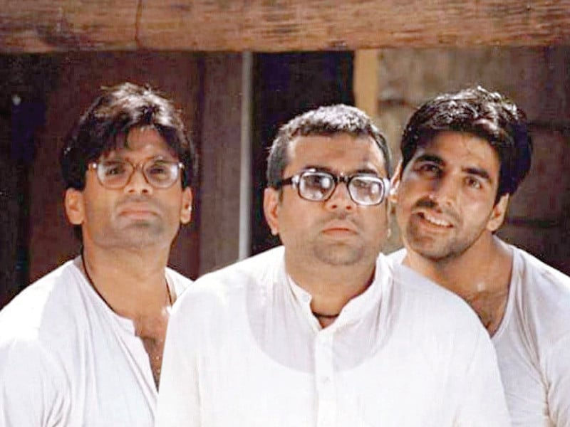 shetty rawal and kumar in a still from hera pheri photo file