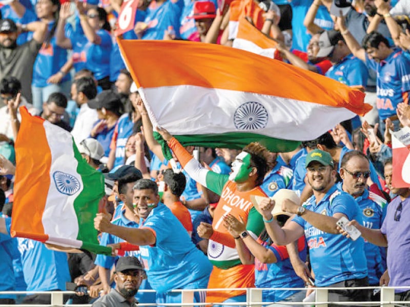 blue jerseys and indian flags dominated the scene in and around dubai cricket stadium during the icc champions trophy final photo afp