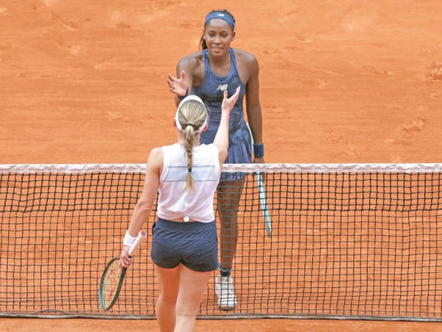 winner coco gauff of us shakes hands with russia s ekaterina alexandrova at the end of their women s singles match at french open on monday photo afp