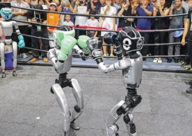 robots play drums serve drinks at china expo