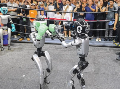 robots play drums serve drinks at china expo