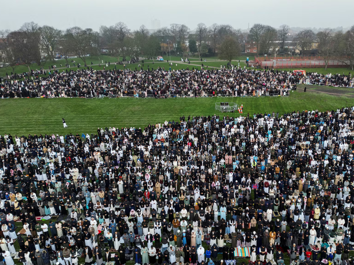 Eid prayers offered by worshippers. — AFP