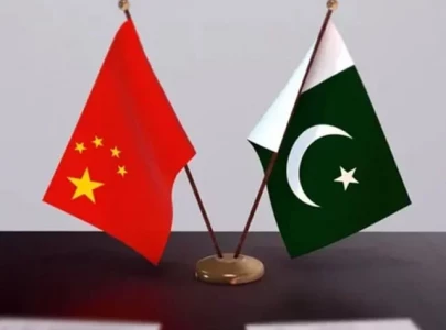chinese and pakistani businessmen sign mous
