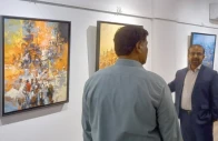 visitors admire paintings on display at the luminous horizons exhibition photo express