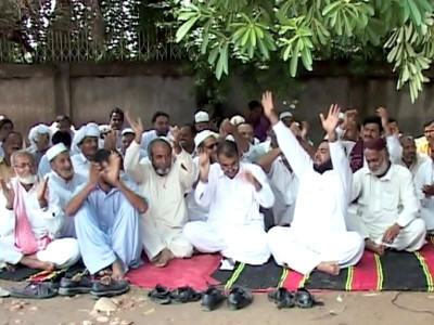 mangla dam raising project affected families take to the streets stage sit in