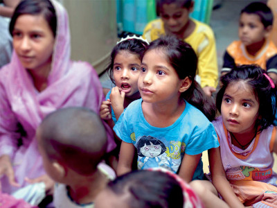 humanitarian work helping children go back to school one lesson at a time