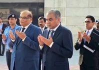 naqvi visits khaleda zia s grave pays tribute
