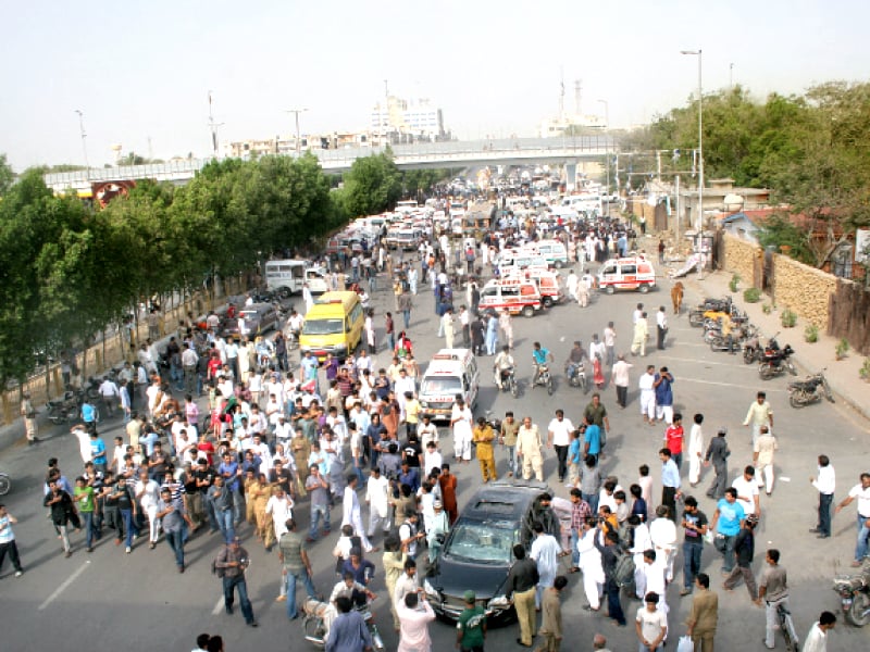 karachi s shias targeted in roadside bomb ahead of annual rally