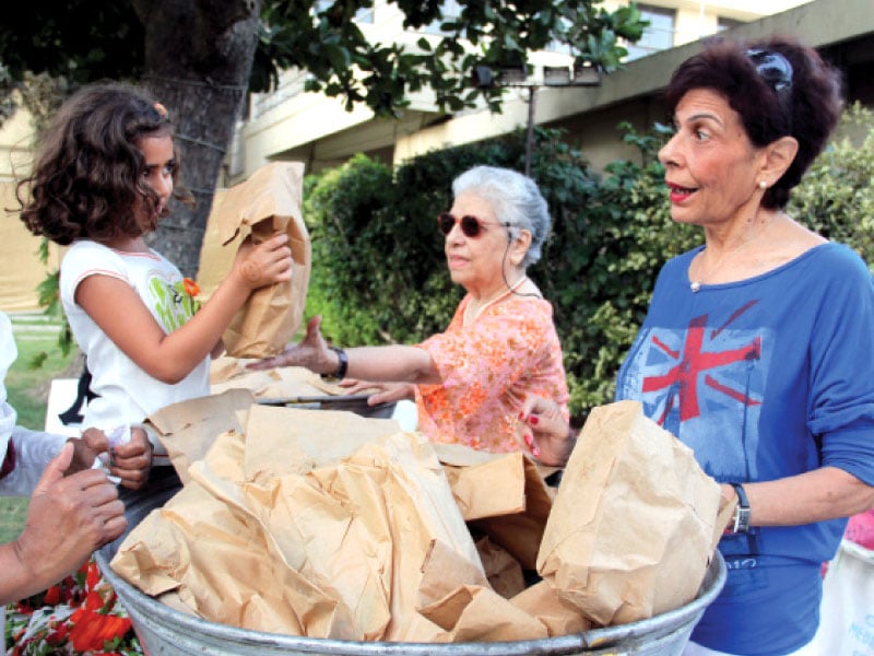 nauroz mubarak in true karachi parsi style new year heralded with charity mela