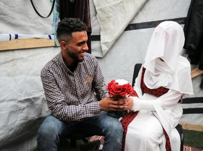 in pictures displaced palestinian couple holds wedding in gaza tent in pictures displaced palestinian couple holds wedding in gaza tent