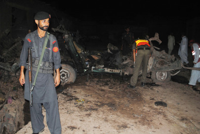 10 killed 18 injured as car bomb rips through peshawar market 10 killed 18 injured as car bomb rips through peshawar market