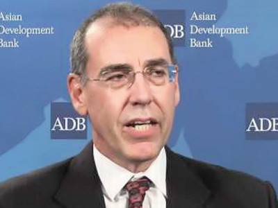 rating downgrade raises risk premium on investment adb