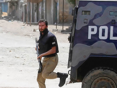 two law enforcers injured as police van drives into an ambush