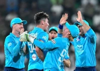 england s young pacer henry crocombe second left celebrates with his teammates after taking the wicket of pakistan s opener saim ayub in odi tri series match at lahore on october 25 photo afp