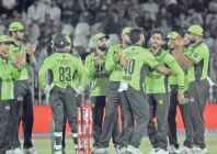 pakistan s arafat minhas celebrates with teammates after wrapping up a five wicket haul with the dismissal of australia s nathan ellis not in the picture in the first odi at rawalpindi cricket stadium photo online