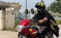 female riders navigate road aggression