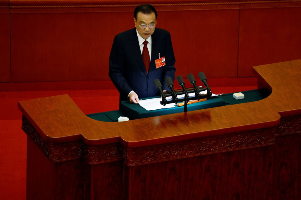 chinese premier li keqiang speaks at the opening session of the national people s congress npc at the great hall of the people in beijing china march 5 2022 photo reuters