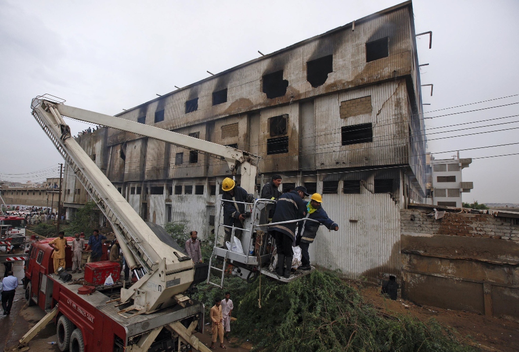 karachi factory fire out of 259 dead only 140 identified as yet