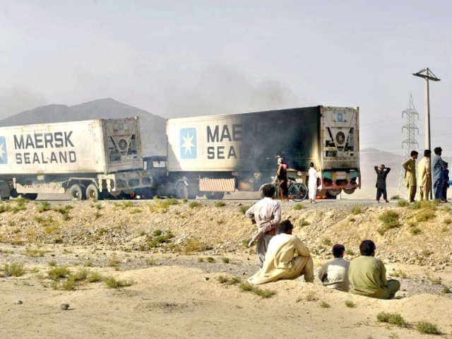 insurgent attack two nato trucks set ablaze