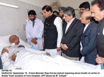 four days late pm flies into karachi to review factory fire