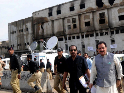karachi factory fire rehman malik posits incident as terror bid
