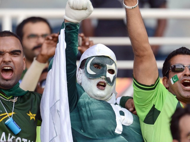 Pakistan fans cheer during the ICC Twenty20 Cricket World Cup match between Pakistan and New Zealand at the Pallekele International Cricket Stadium in Pallekele on September 23, 2012. PHOTO : AFP 