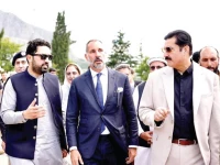 khyber pakhtunkhwa chief minister sohail afridi interacts with prince rahim aga khan on his arrival in lower chitral photo express