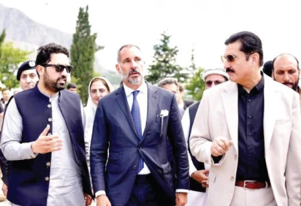 khyber pakhtunkhwa chief minister sohail afridi interacts with prince rahim aga khan on his arrival in lower chitral photo express