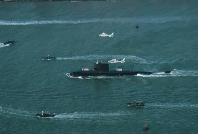 the first hangor class submarine receives a traditional naval welcome with pakistan naval academy cadets presenting a ceremonial salute while pakistan navy z 9ec helicopters perform a fly past overhead photo app