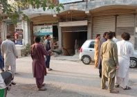 people stand in the street following an earthquake in peshawar photo reuters