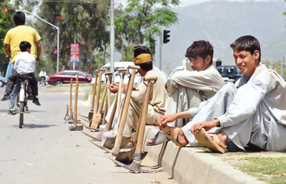 pti govt launches e mazdoor card pti govt launches e mazdoor card