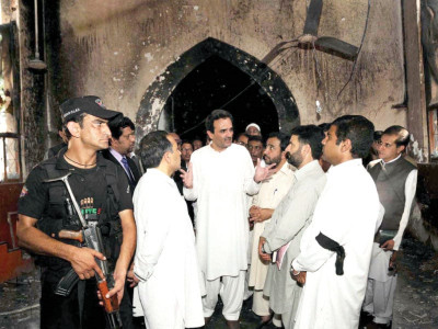 rebuilding cm visits burnt church in mardan
