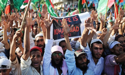 thousands rally in karachi over blasphemous film cartoons thousands rally in karachi over blasphemous film cartoons