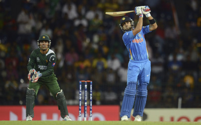 india clobber pakistan to stay in world t20