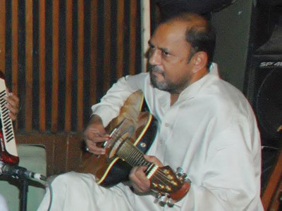 famous guitar teacher shot dead